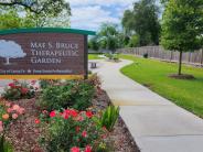 Mae S. Bruce Therapeutic Garden Sign and Sidewalk